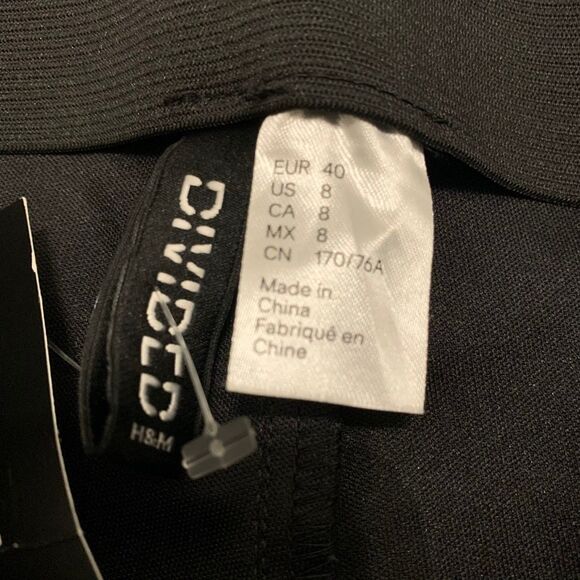 Divided H&M faux Vegan Leather Flare Slit pants flare bottom black NWT Sz 8 - Picture 5 of 8